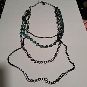black multistrand chain necklace with teal green beads and stones